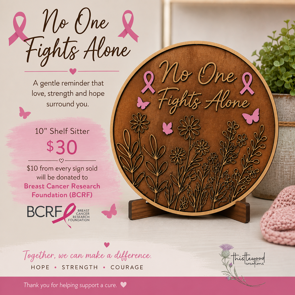 A wooden Breast Cancer Research Foundation shelf sitter plaque featuring the engraved text 'No One Fights Alone' with pink ribbons, butterflies, and floral designs, displayed on a stand in a styled home setting. Thistlewood Creations